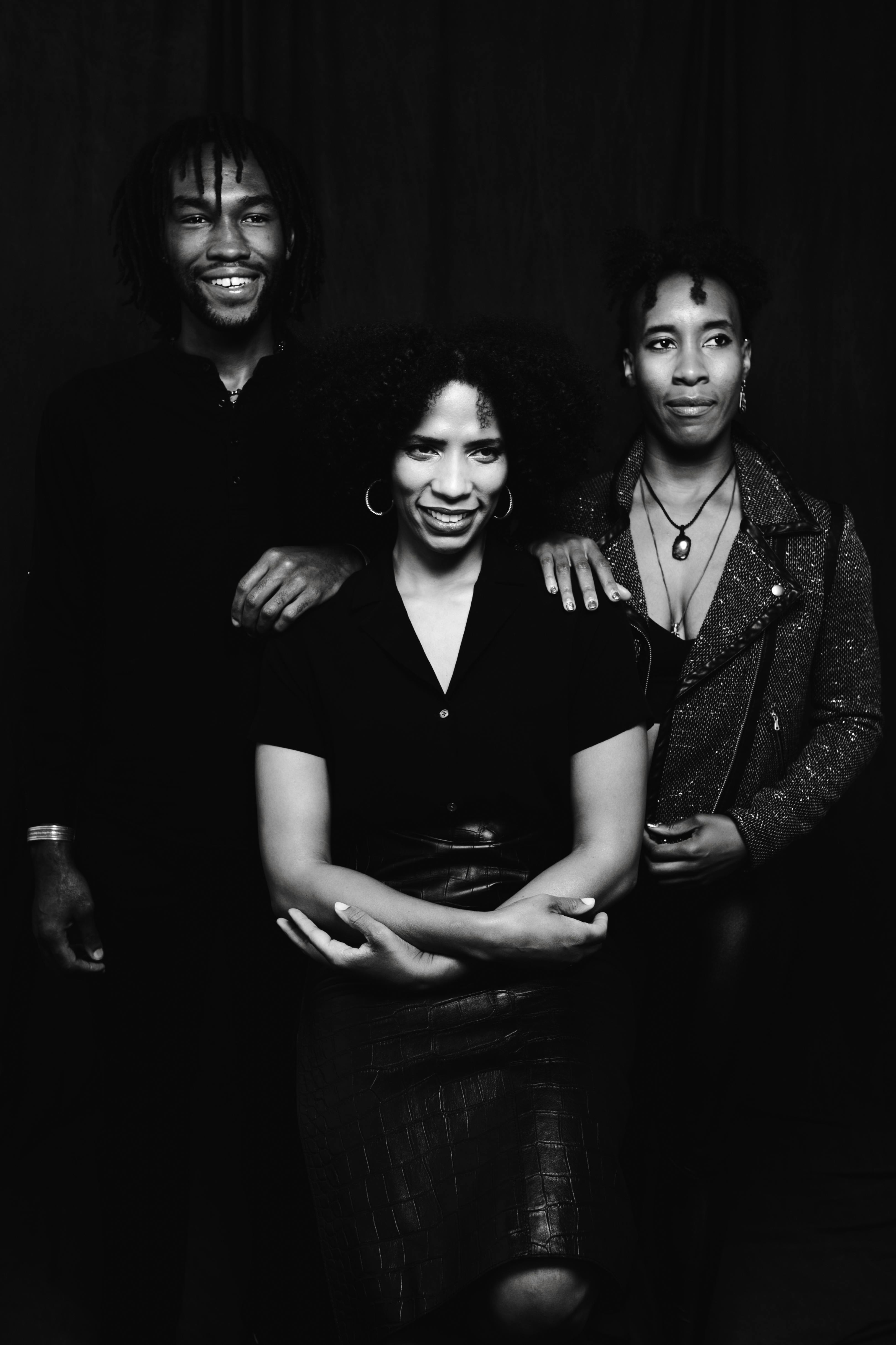 Grayscale Photo of 2 Women and Man