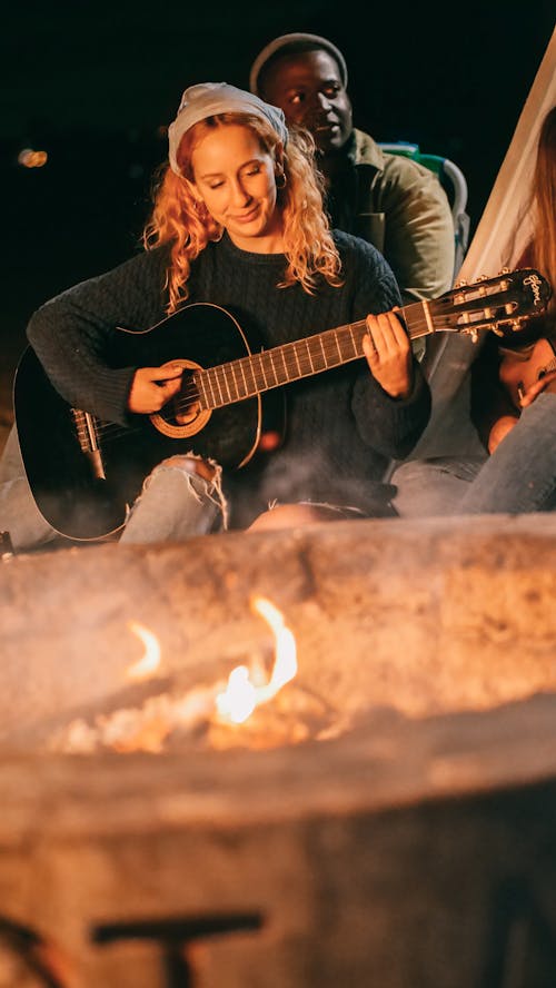 Woman Playing Guitar