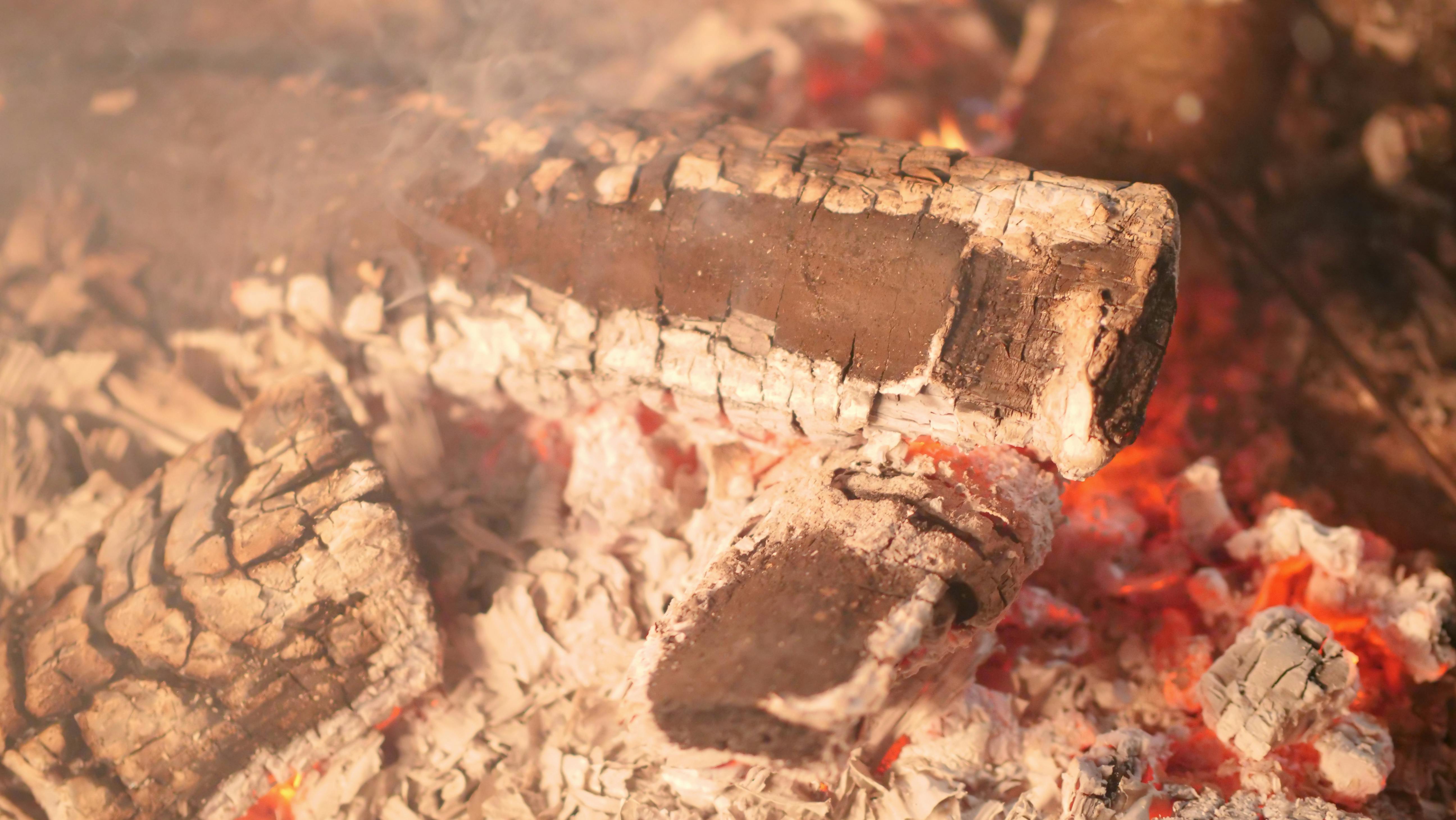 close up photo of a burning charcoal