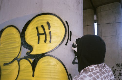 Gratis lagerfoto af graffiti, hærværk, holde Lagerfoto