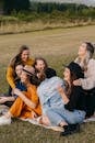 Laughing friends having fun on picnic