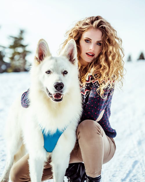 Beautiful Woman with White Short Coated Dog