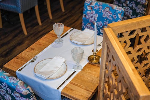 Table Setting for Two on Wooden table