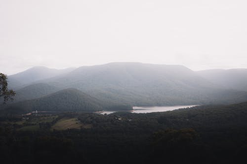 Green Mountains Under White Sky