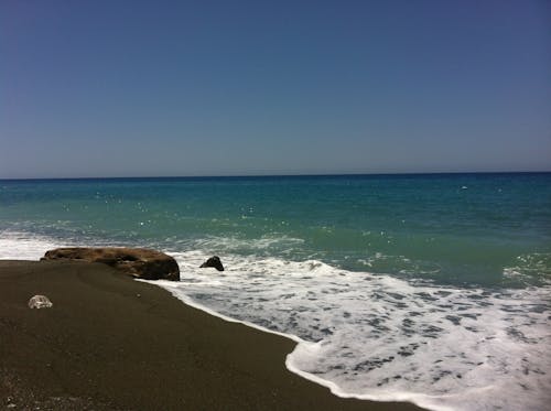Darmowe zdjęcie z galerii z niebieska woda, plaża, plaża piaskowa