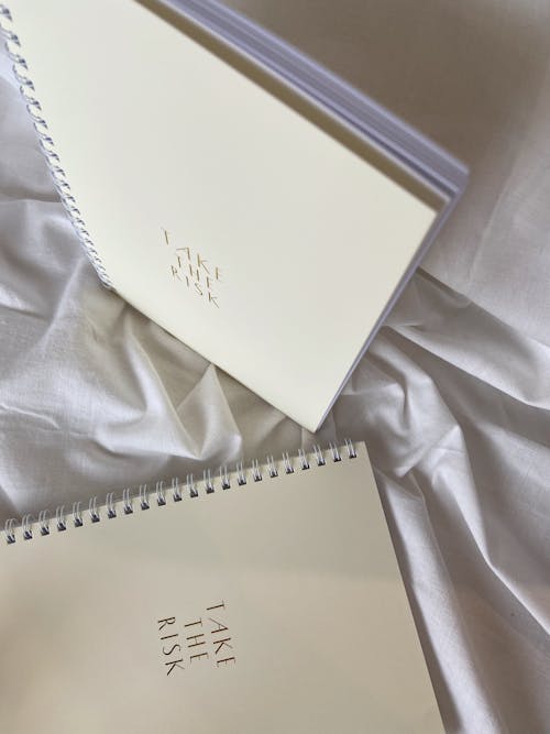 White Notebook on White Textile