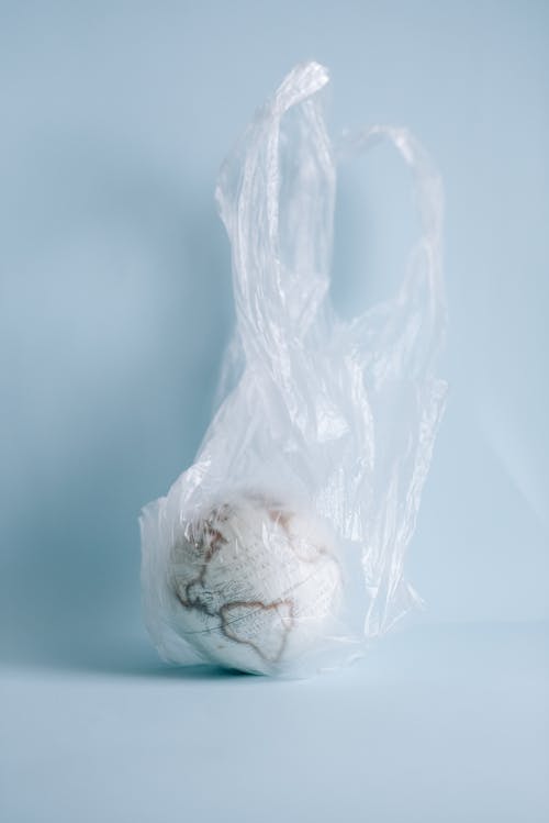 A White Globe in a Plastic Bag