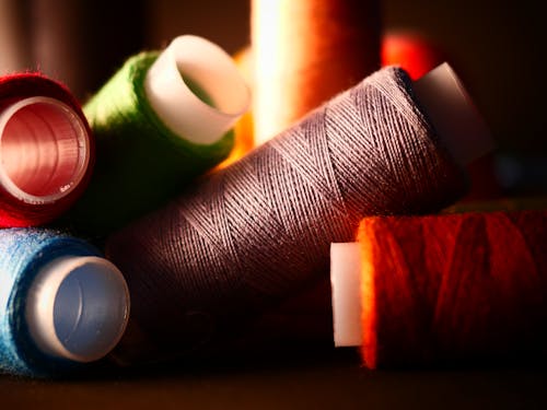 Close-up Photo of Colorful Threads 