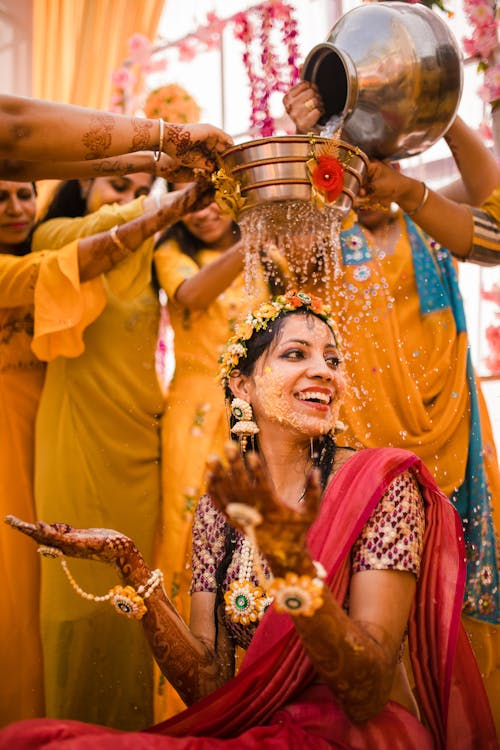 Pouring of Water on a Happy Woman 