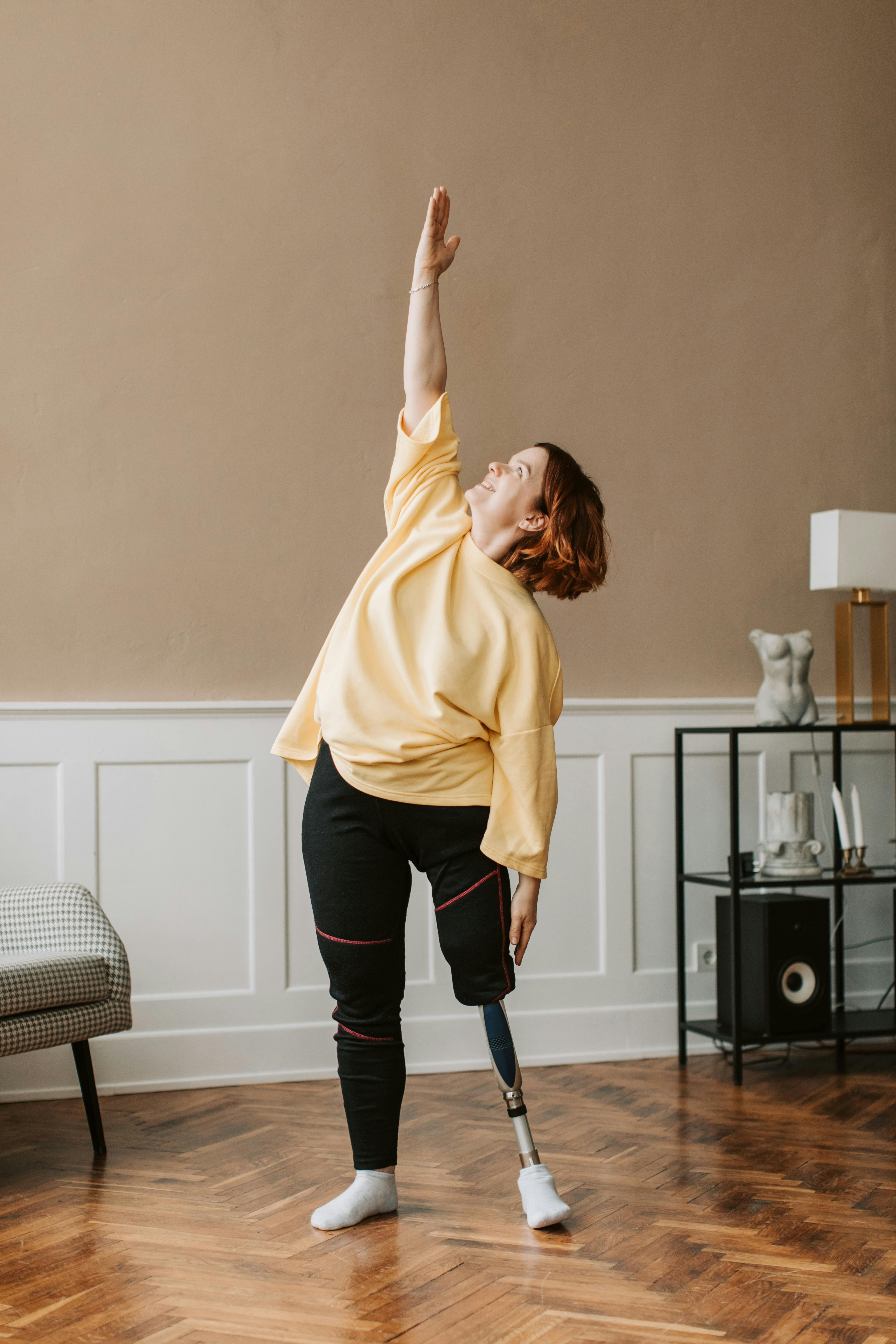 Woman smiling while doing chair exercises