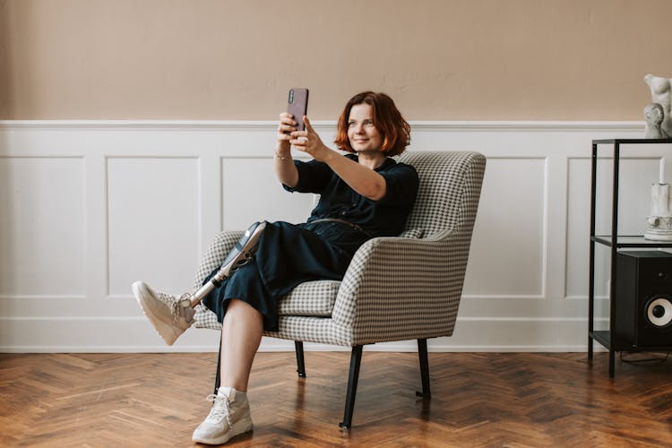 A Woman Taking A Selfie 