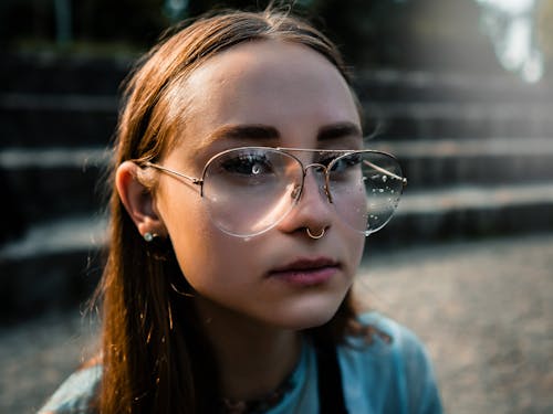 Free A Woman with Wet Eyeglasses Stock Photo