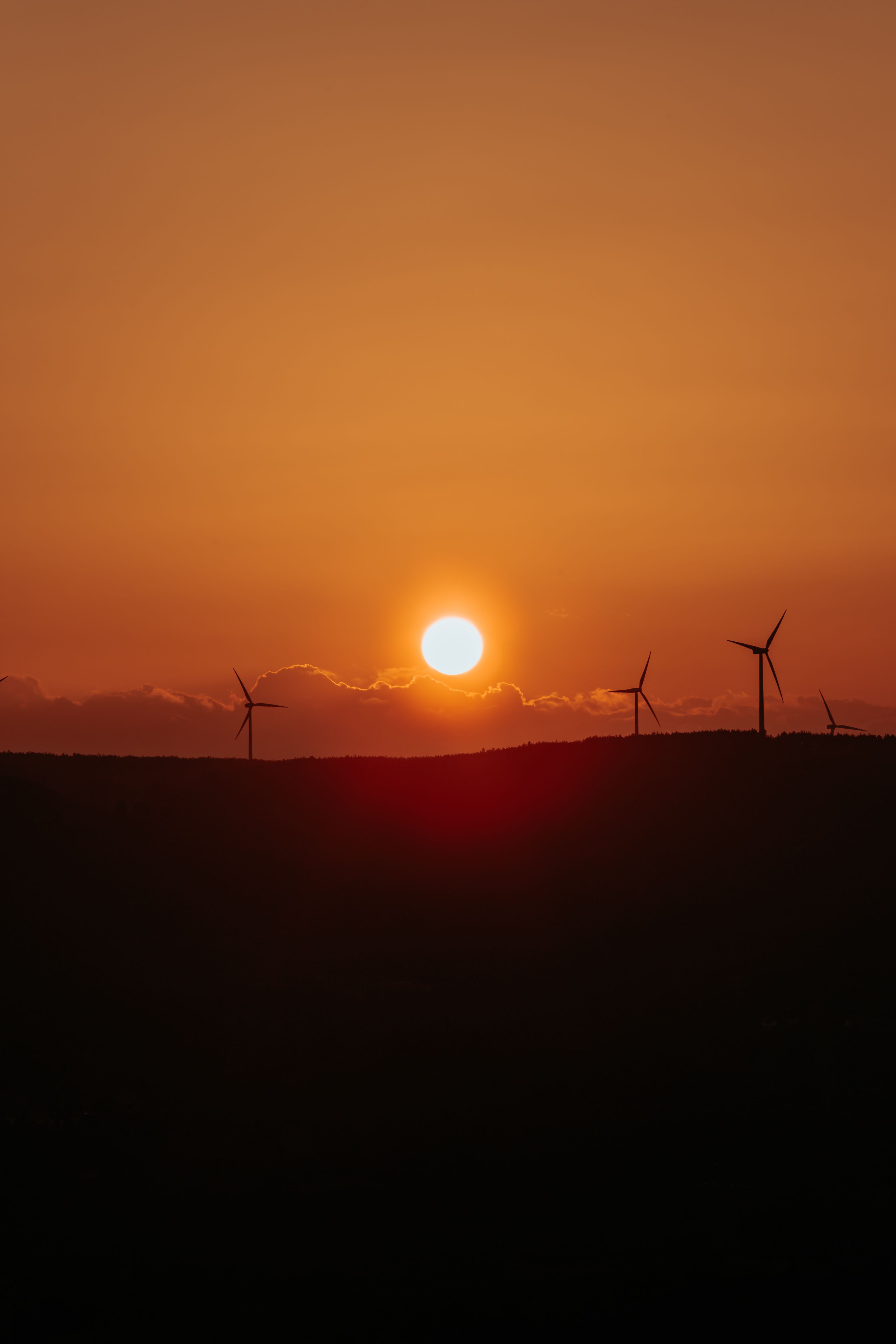 Silhouette of Wind Turbines during Sunset · Free Stock Photo