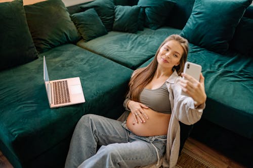 Pregnant Woman talking Selfies