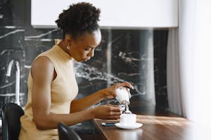 Woman making Coffee