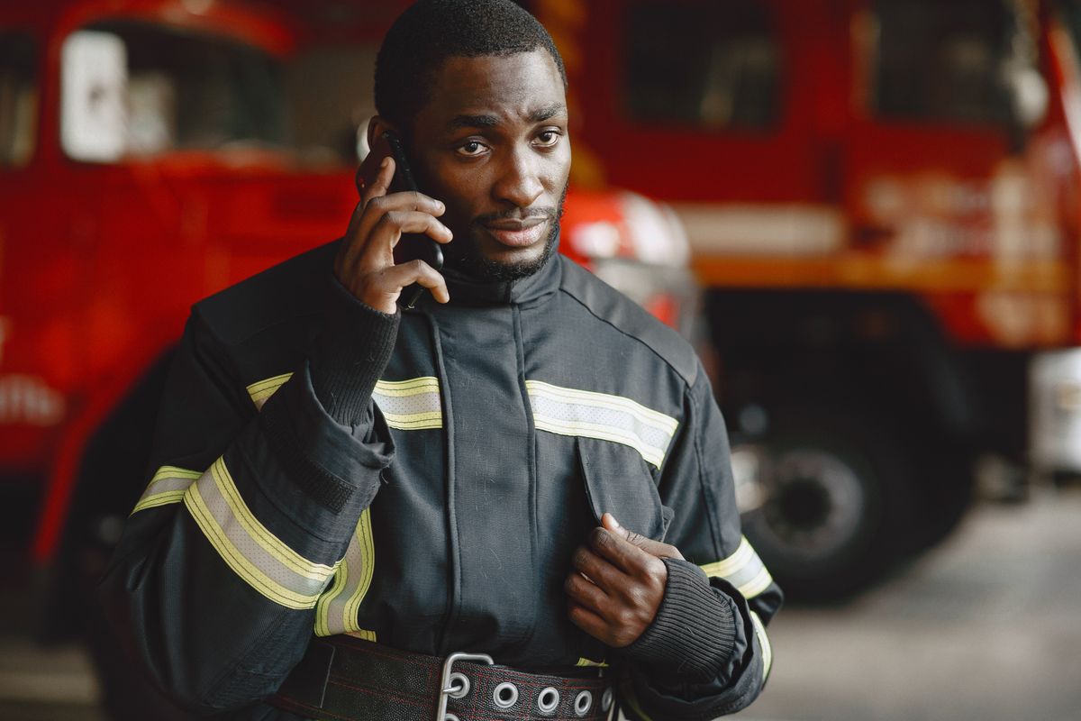 Ambulance driver taking an emergency call