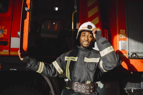 Free Fireman holding his Hard Hat  Stock Photo