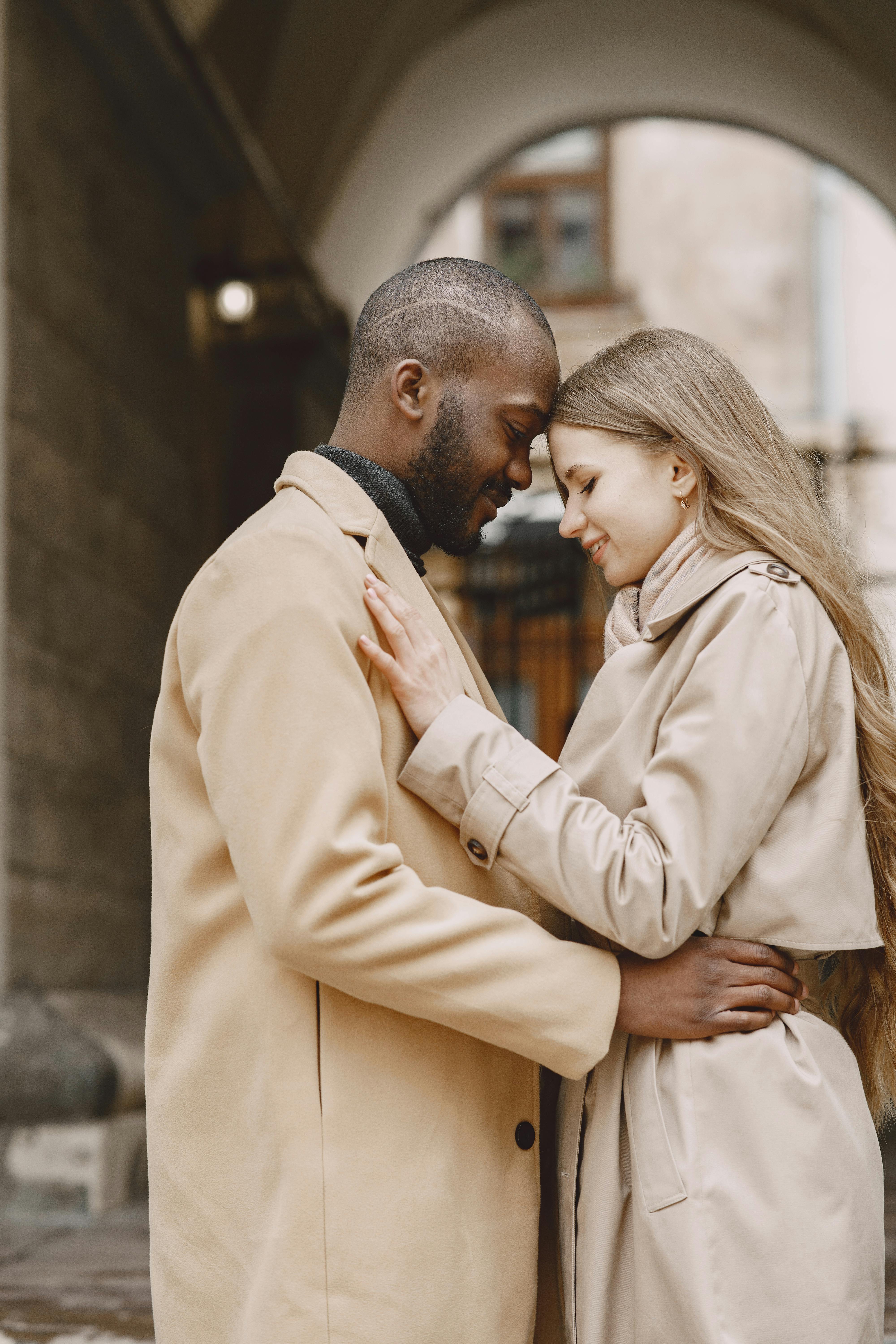 Young Man Stroking The Hair Of His Girlfriend In Bed Stock Photo  Download  Image Now  iStock