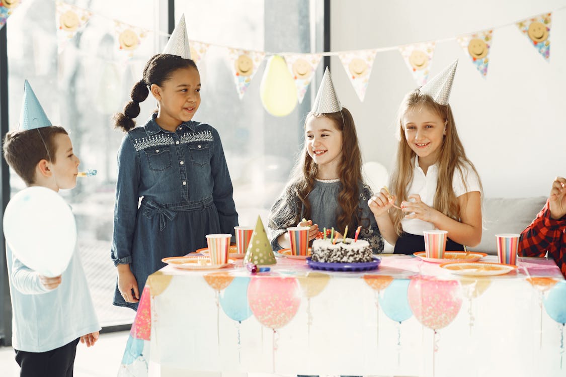 Kids Standing Near the Table · Free Stock Photo