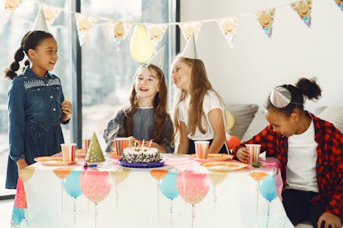 Free Girls Sitting at the Table Stock Photo