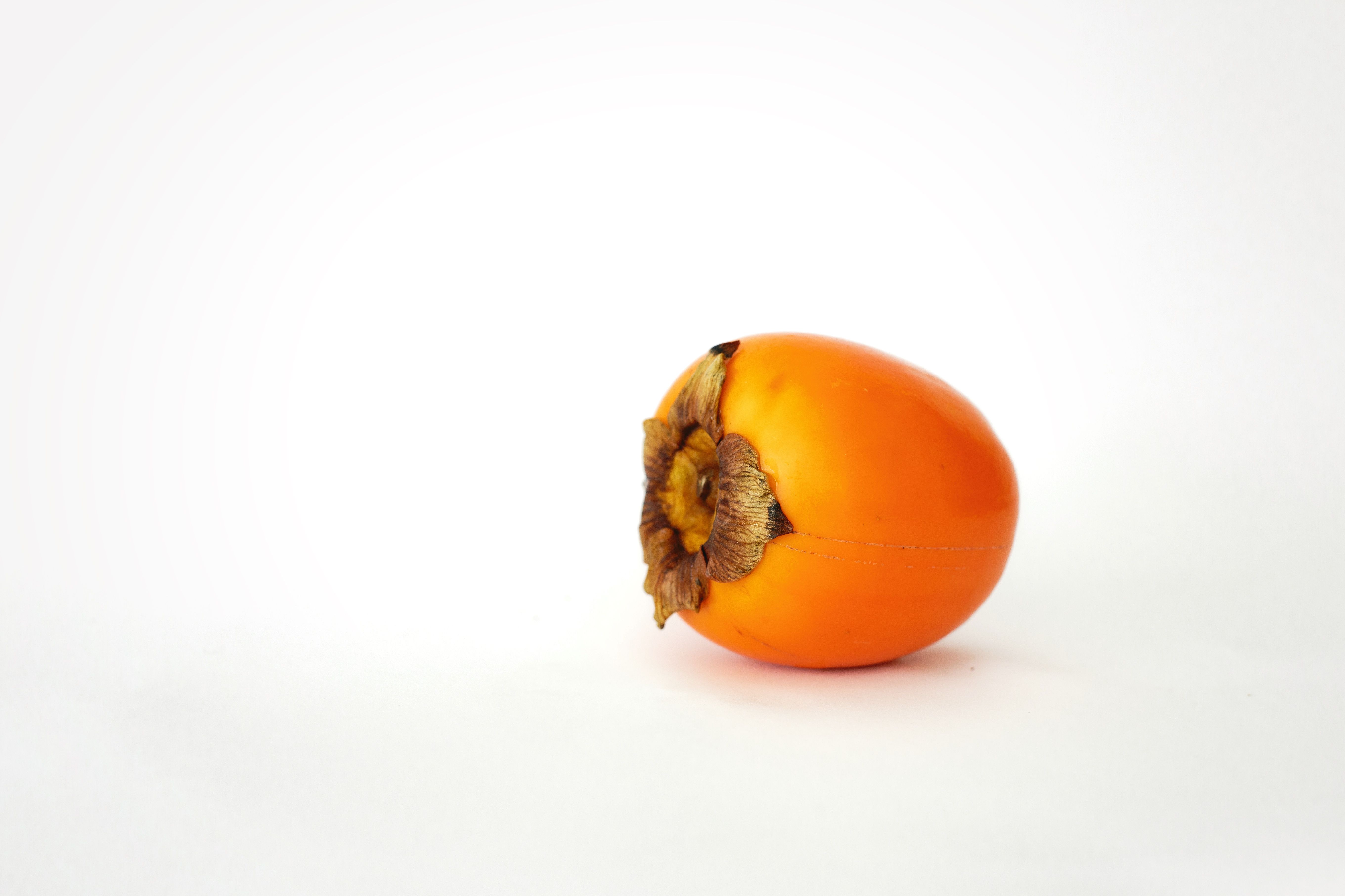 Close-up Photo of Persimmon Fruit · Free Stock Photo