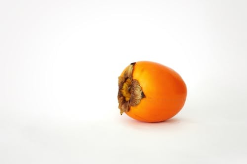 Free Close-up Photo of Persimmon Fruit  Stock Photo