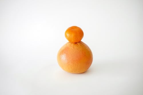 Mandarin on Top of Orange Fruit 