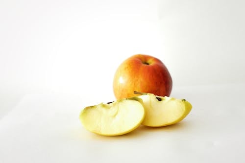 Sliced Apple on White Surface 