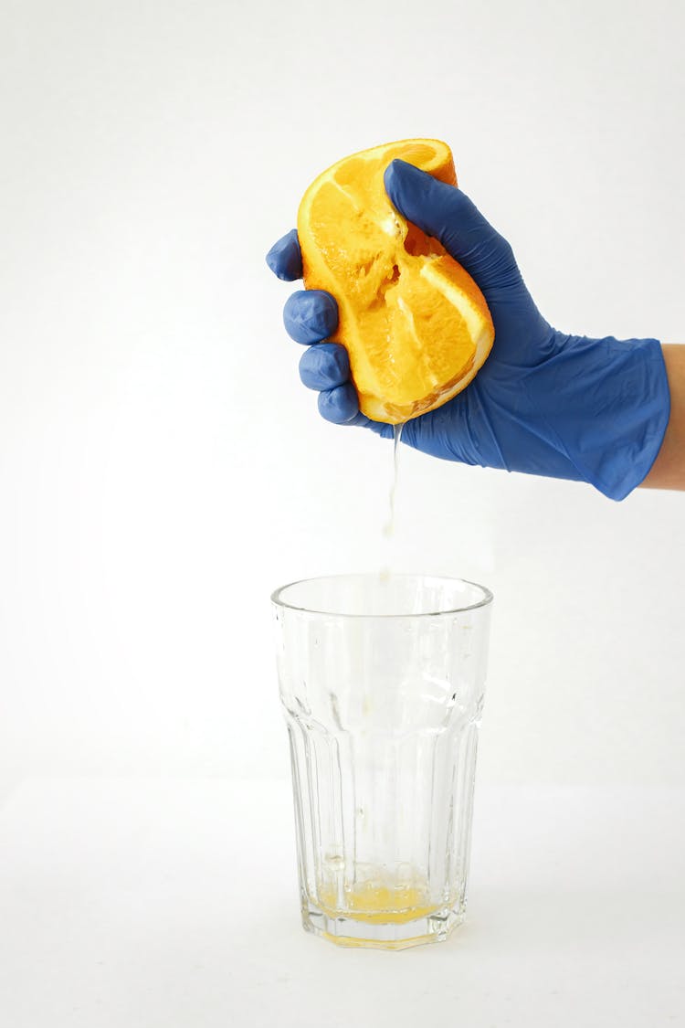 Squeezing Of Orange Juice 