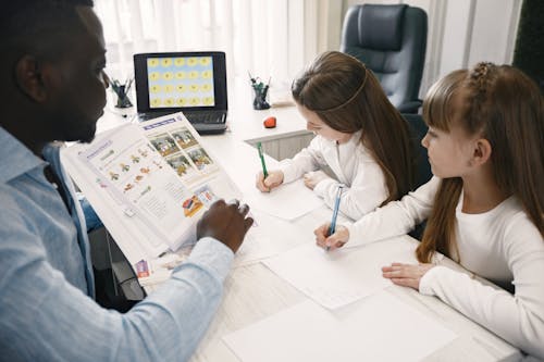 A Man Teaching His Students