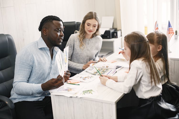 A Man Teaching His Students