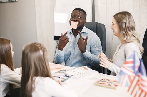 A Man with Sticky Note on His Mouth