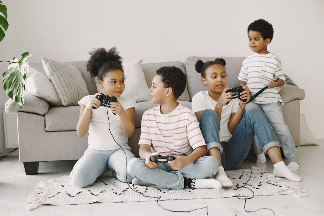A Group Of Kids Playing Games At