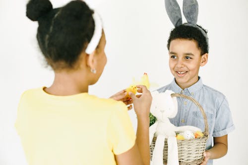 Boy in Blue Shirt Holding Brown Wicker Basket