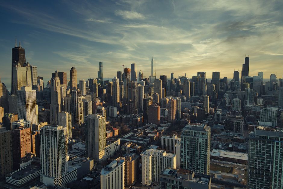 Mesmerizing aerial cityscape of Chicago highlighting its iconic skyline at dusk, showcasing urban architecture.