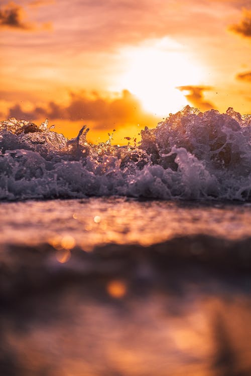 Sea Waves in Macro Shot Photography During Sunset
