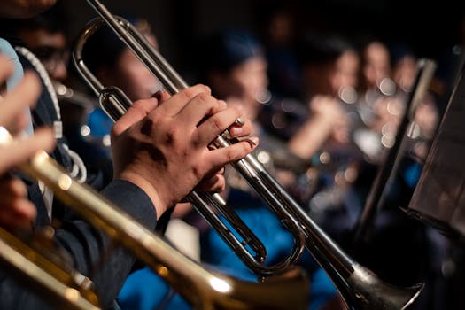 Detailed image of musicians with trumpets during a performance, highlighting musical craftsmanship.
