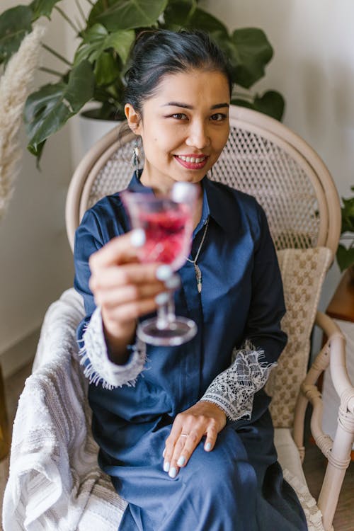 Woman Holding A Glass With Wine