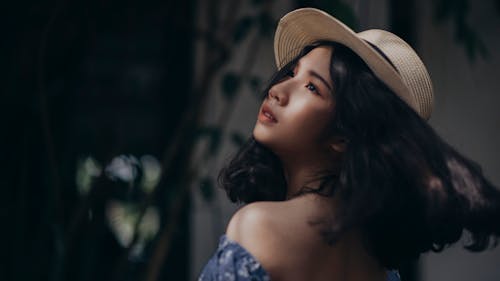 Woman Wearing Brown Hat