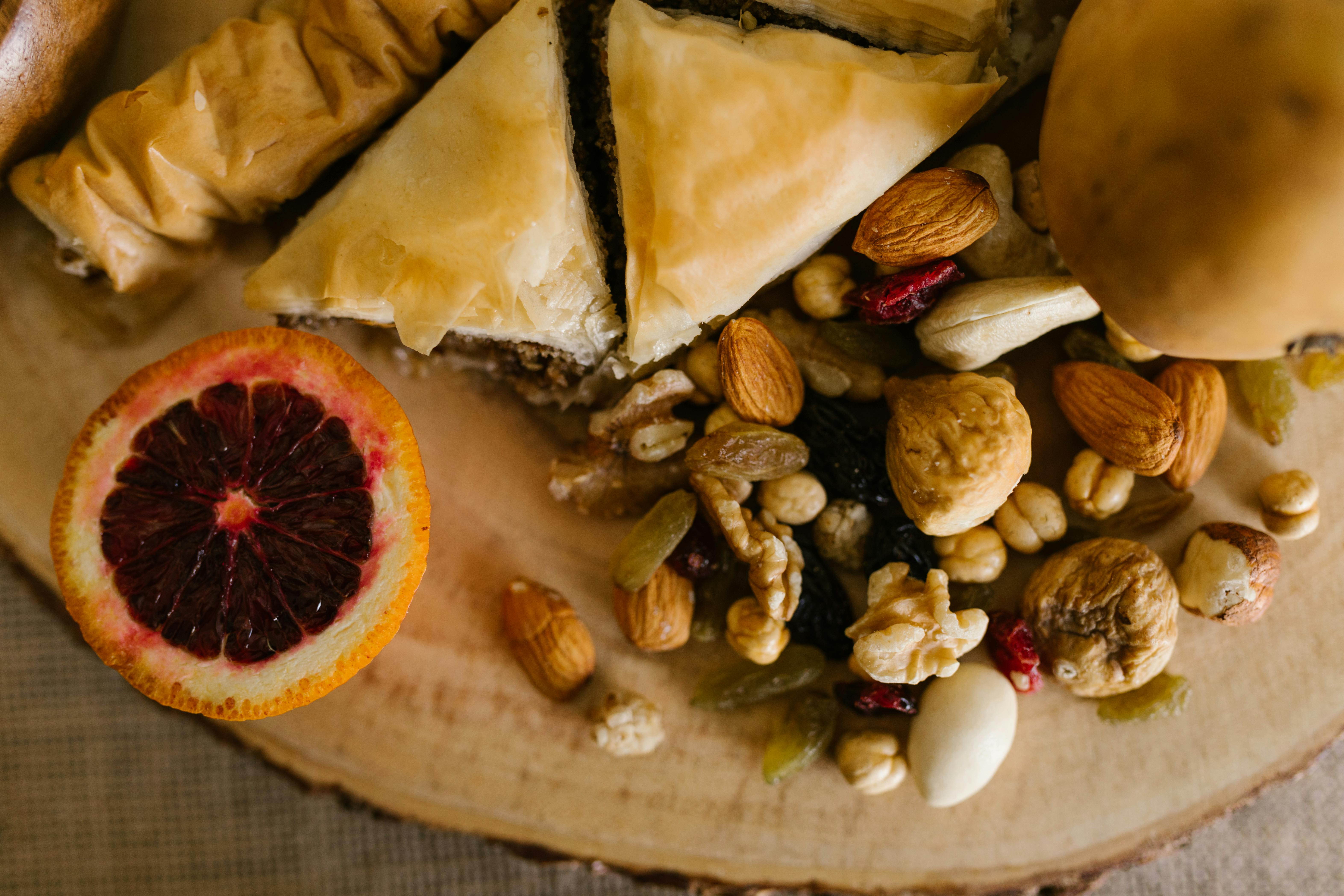 sliced bread and nuts on wooden board