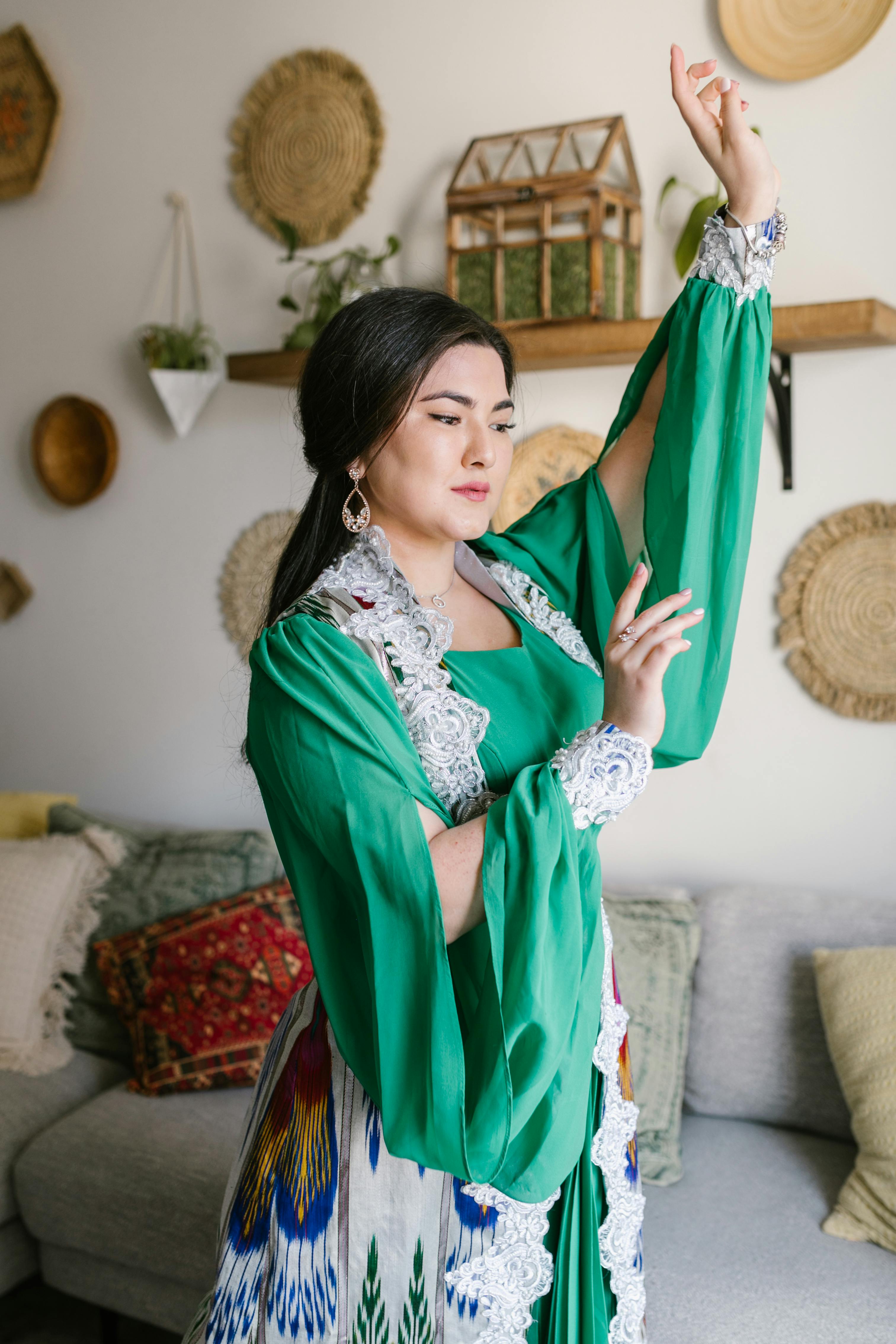 woman in green dress dancing