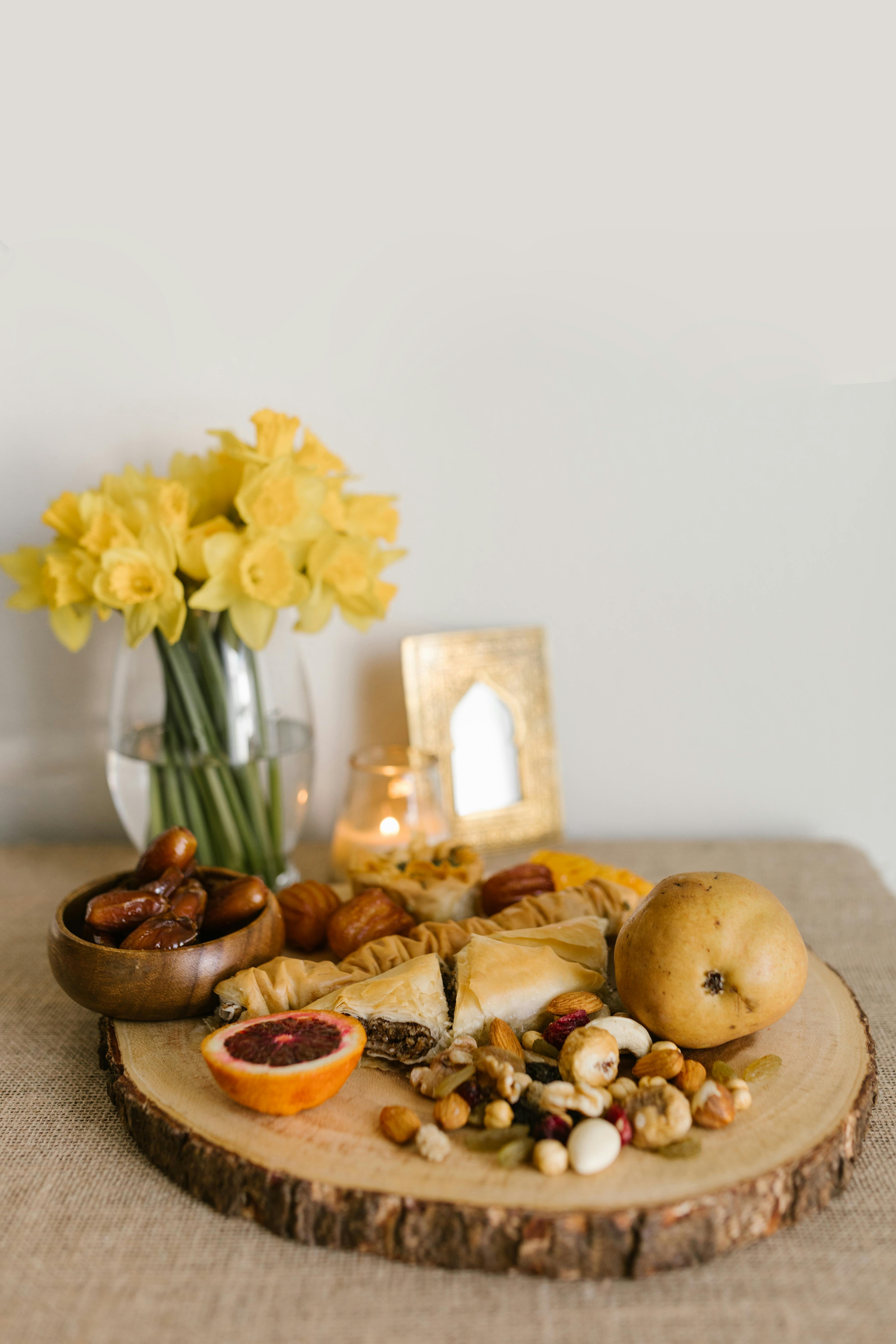 fruits and nuts on a wooden board