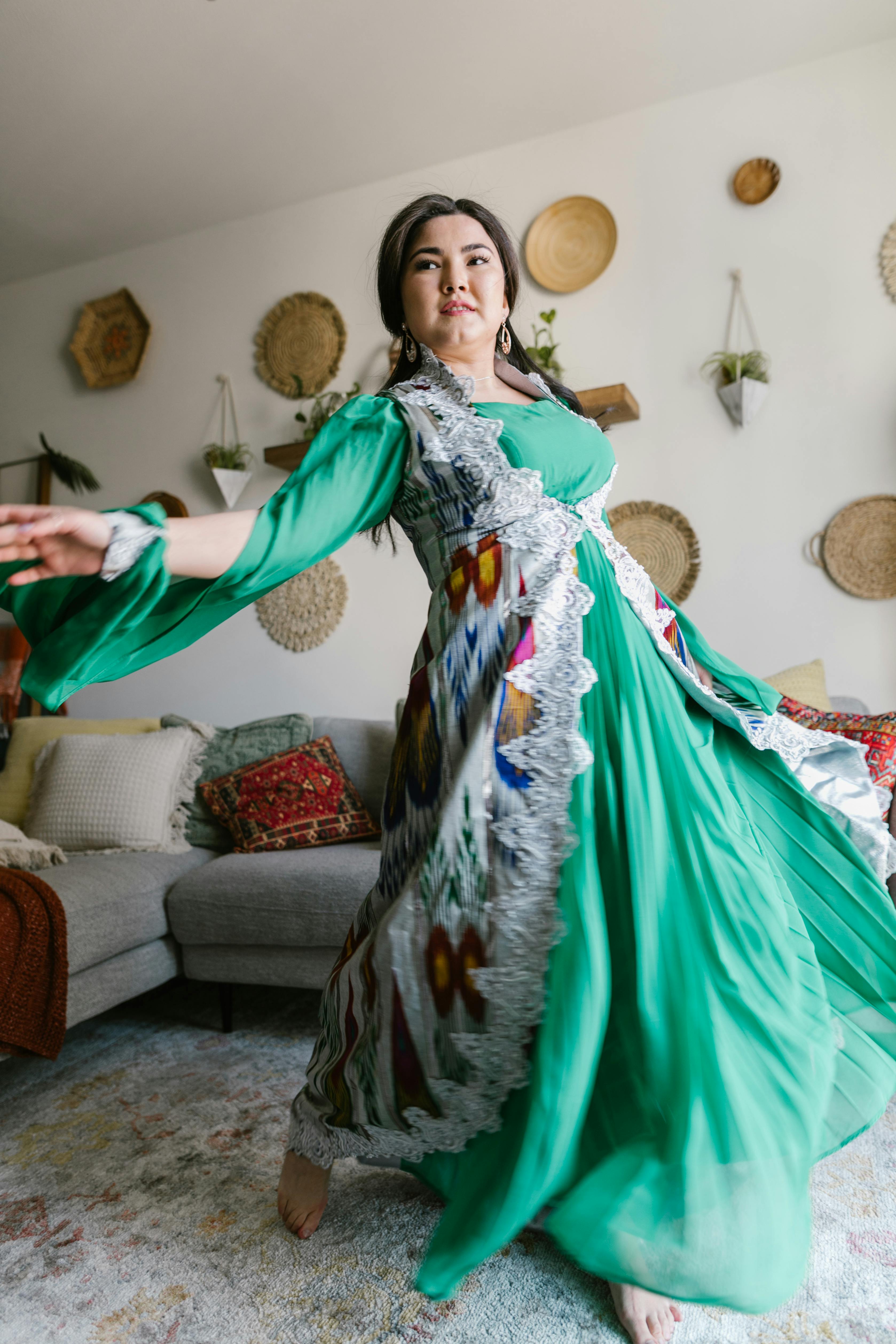 woman in green dress posing