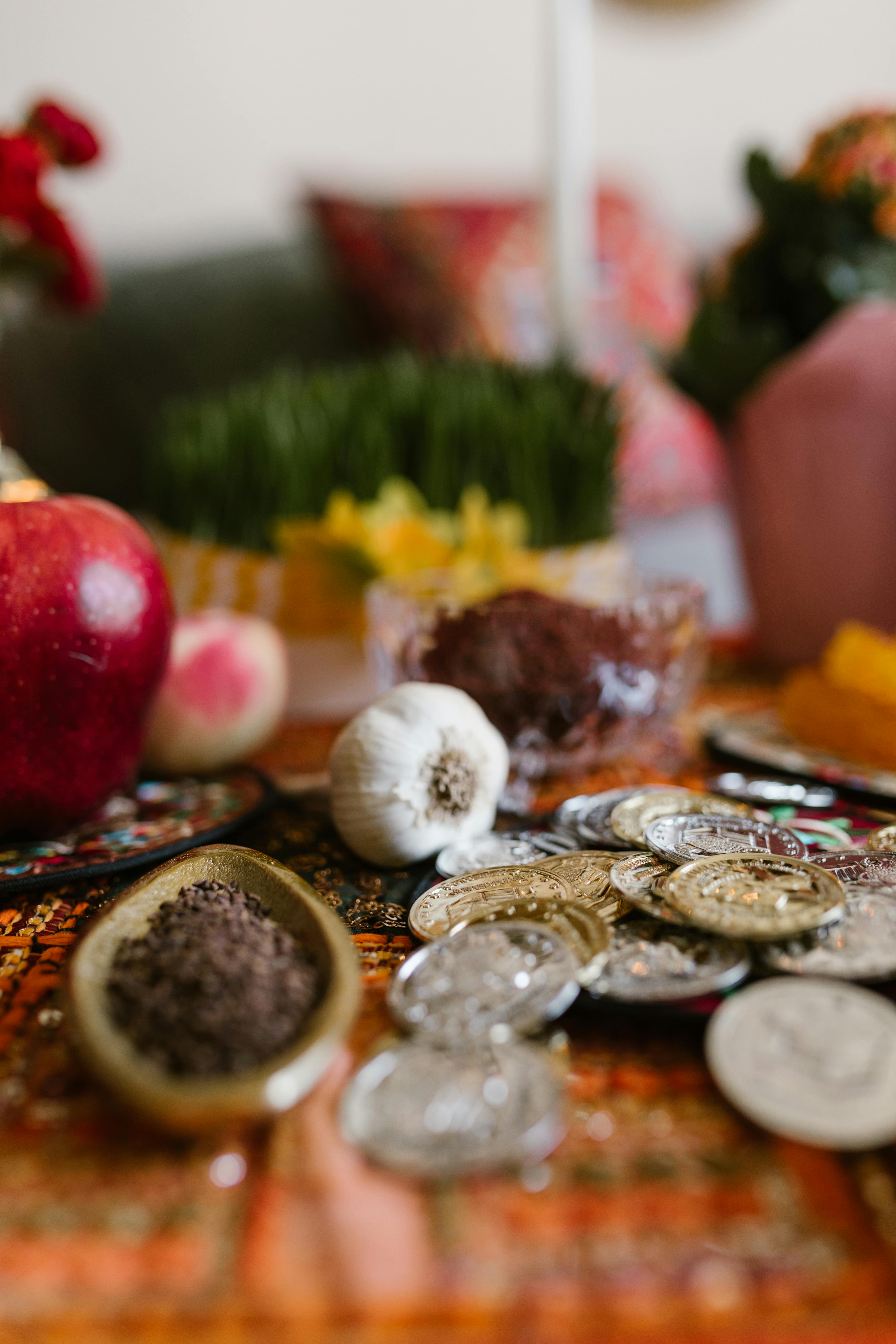traditional food and coins on table
