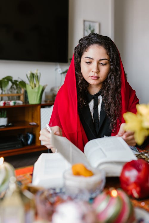 Woman With Red Veil Reading A Book