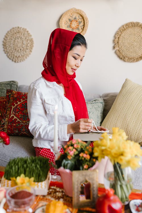 Woman Wearing White Shirt And Red Turban