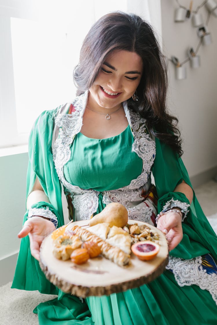 Woman Holding A Tray Of Food