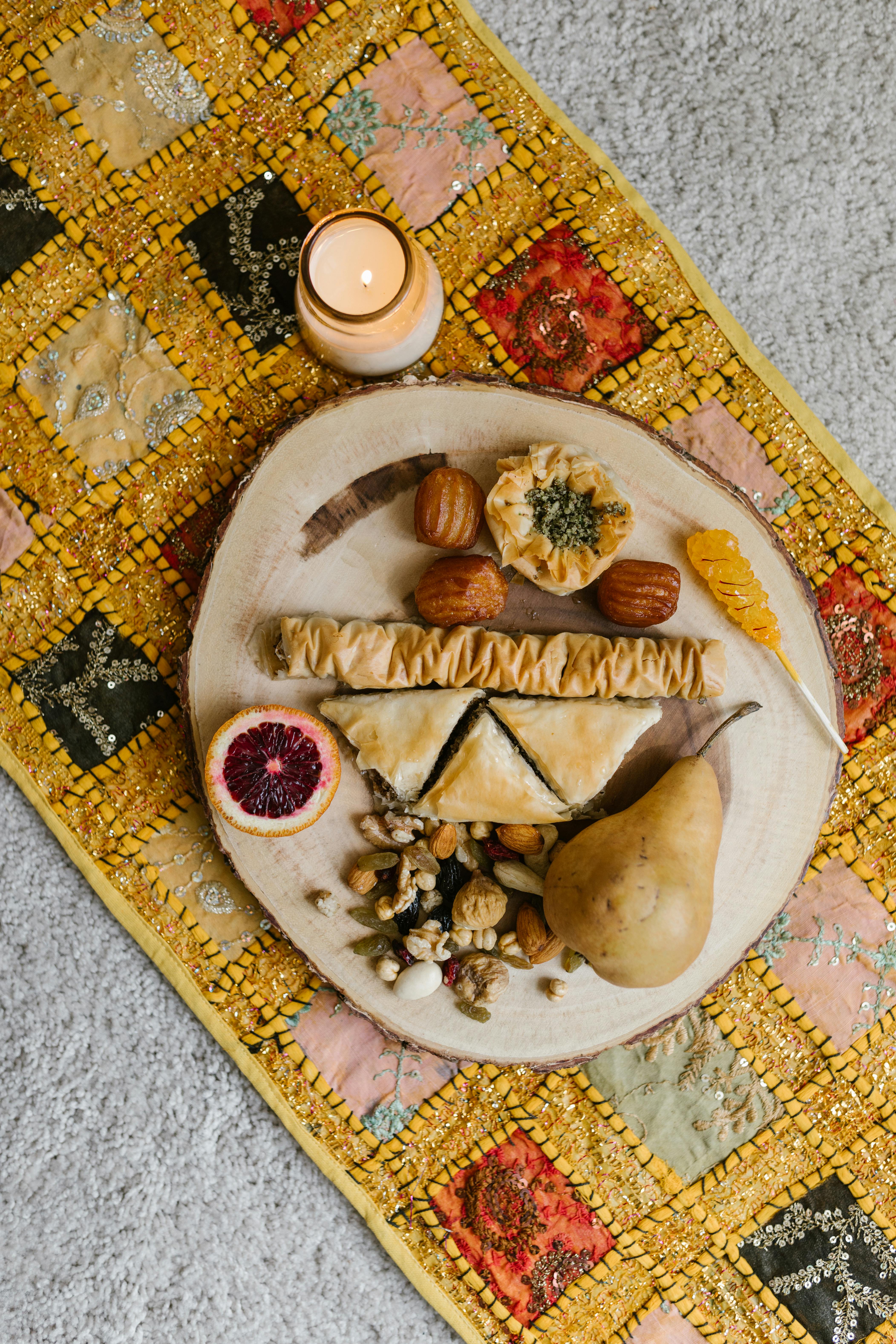 A elegant assortment of nuts, fruits, and pastries, celebrating Nowruz indoors.