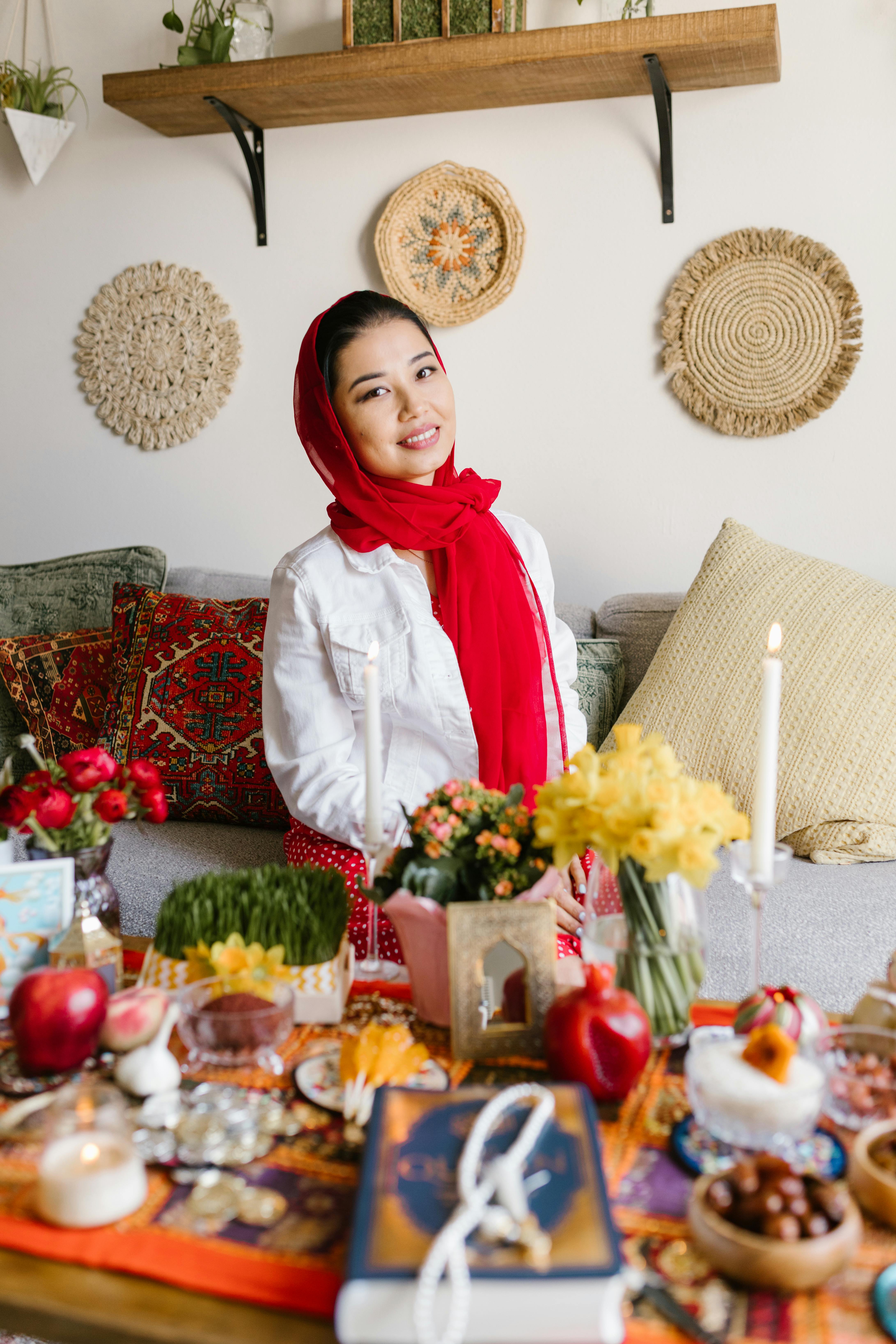 woman standing beside a table with food