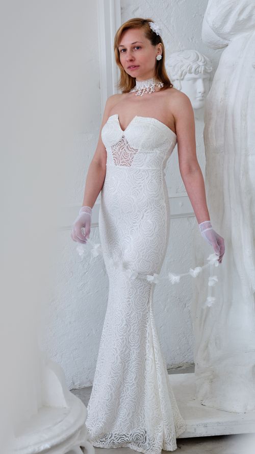 Free Full body of content female in elegant long dress and gloves looking at camera Stock Photo